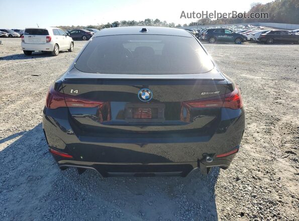 WBY23HD06SFU87731 2025 BMW I4 Black Вид ззаду