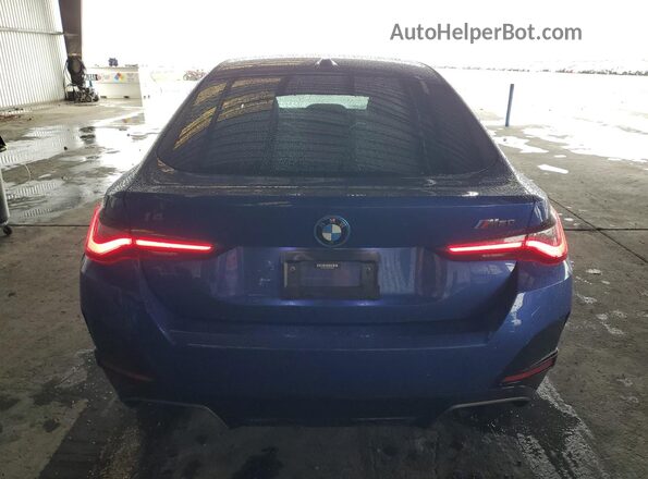 WBY33AW09NFM16553 2022 BMW I4 Blue Widok z tyłu