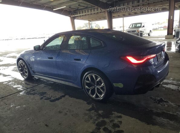 WBY33AW09NFM16553 2022 BMW I4 Blue Tył lewy