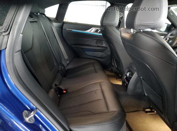 WBY33AW09NFM16553 2022 BMW I4 Blue Widok tylnych siedzeń