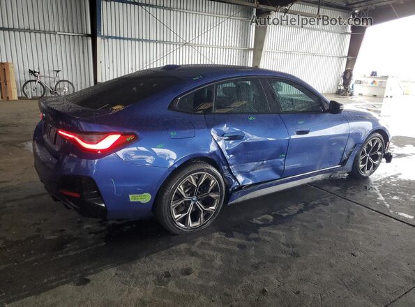 WBY33AW09NFM16553 2022 BMW I4 Blue Tył prawy