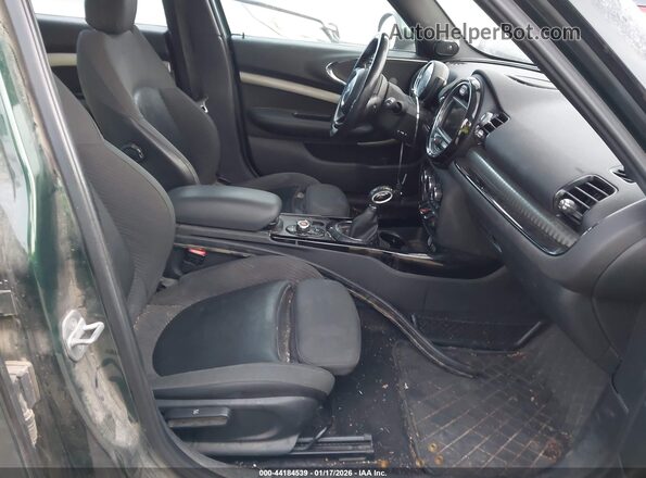 WMWLU5C55H2C46449 2017 MINI CLUBMAN Зеленый Вид салона спереди