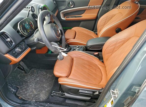 WMZ83BR09P3P61563 2023 MINI COOPER Teal Front interior view