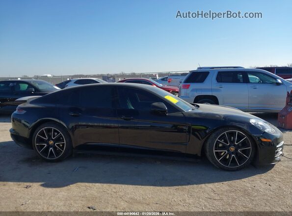 WP0AJ2A75PL100404 2023 PORSCHE PANAMERA Black Widok wnętrza z tyłu