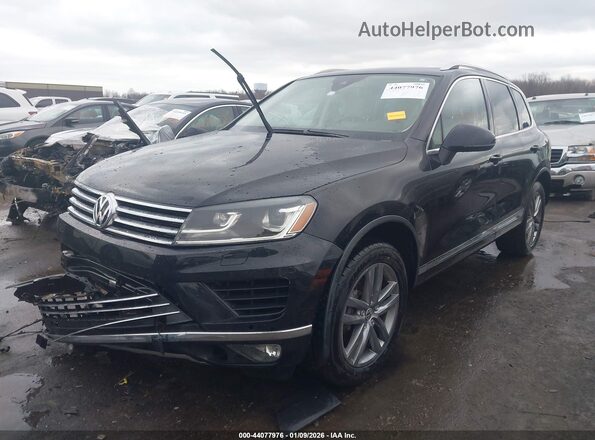 WVGEF9BP3GD010023 2016 VOLKSWAGEN TOUAREG Черный Передняя левая четверть