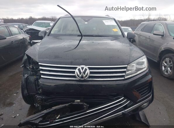 WVGEF9BP3GD010023 2016 VOLKSWAGEN TOUAREG Черный Вид задней части салона