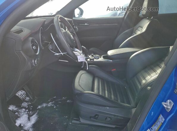 ZASPAKBN6P7D54792 2023 ALFA ROMEO STELVIO Blue Front interior view