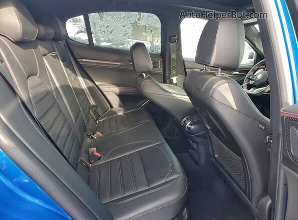 ZASPAKBN6P7D54792 2023 ALFA ROMEO STELVIO Blue Rear seats view