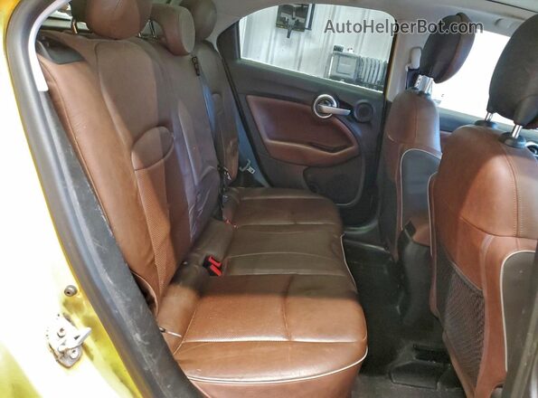 ZFBCFYET6GP341694 2016 FIAT 500X Yellow Widok wnętrza z tyłu