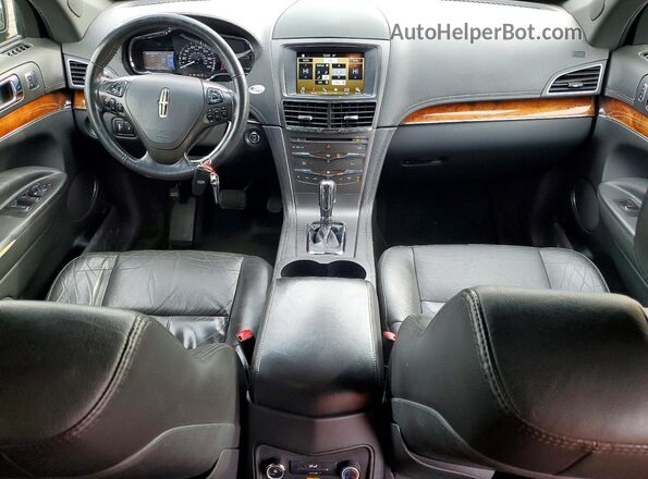 2LMHJ5NK8GBL00806 2016 LINCOLN MKT Черный Вид щитка приборов