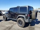2016 Jeep Wrangler Unlimited Sport Black vin: 1C4BJWDG4GL222968