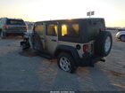 2016 Jeep Wrangler Unlimited Sport Желто-коричневый vin: 1C4BJWDG8GL316349