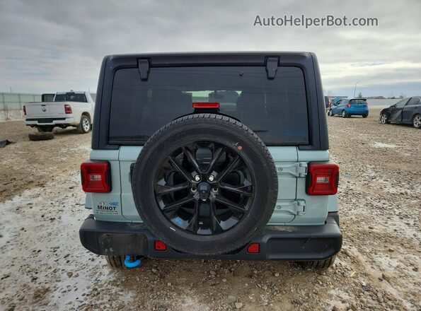 1C4JJXP62PW576877 2023 JEEP WRANGLER Бирюзовый Вид сзади