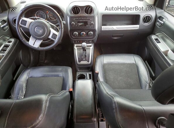 1C4NJCEA0GD656062 2016 JEEP COMPASS Угольный Вид панели приборов