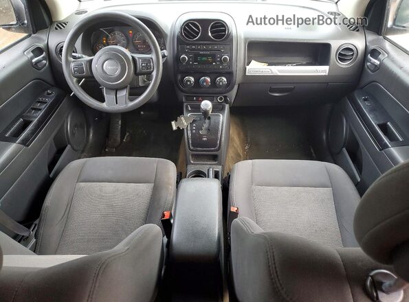 1C4NJDBB3GD778319 2016 JEEP COMPASS Серебряный Вид панели приборов