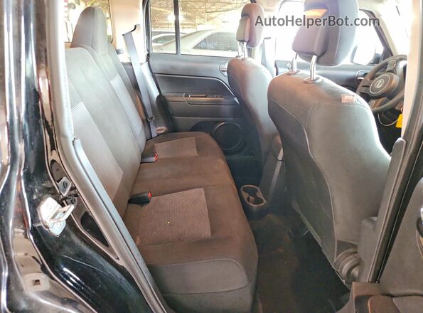 1C4NJPBB7GD574396 2016 JEEP PATRIOT Черный Вид задней части салона