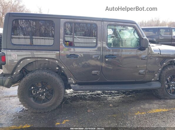 1C4PJXDG7SW608559 2025 JEEP WRANGLER Gray Widok wnętrza z tyłu