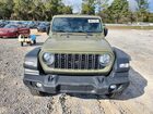 2025 Jeep Wrangler Sport Зеленый vin: 1C4PJXDGXSW516815 Damage: Front Bumper, Heavy Scratch, > 12 Inches
