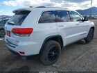 2018 Jeep Grand Cherokee Laredo E 4x4 Белый vin: 1C4RJFAG9JC470174