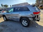 2016 Jeep Grand Cherokee Laredo Серебряный vin: 1C4RJFAGXGC477952
