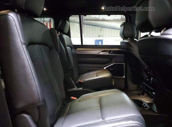 1C4SJSBP3TS156327 2026 JEEP GRAND Black Vista interior trasera