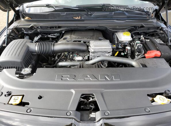 1C6SRFFT4TN212045 2026 RAM 1500 Серый Вид задней части салона
