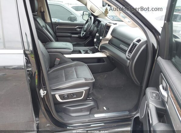 1C6SRFJTXKN807486 2019 RAM 1500 Черный Вид салона спереди