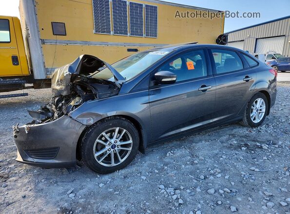 1FADP3F21GL261790 2016 FORD FOCUS Gray Vista tres cuartos delantera izquierda