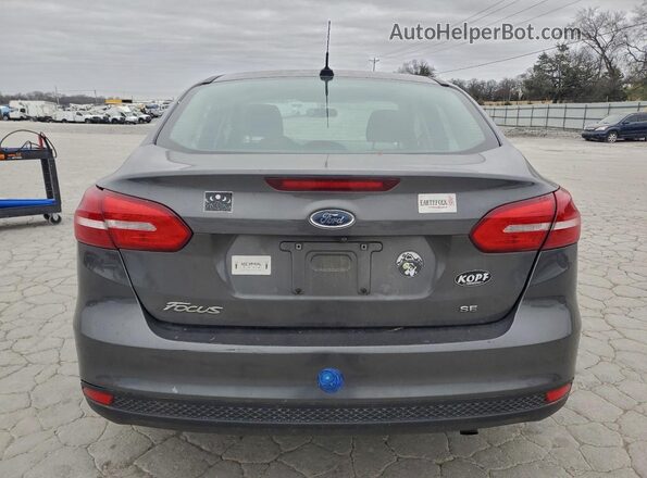 1FADP3F28JL214876 2018 FORD FOCUS Gray Vista trasera