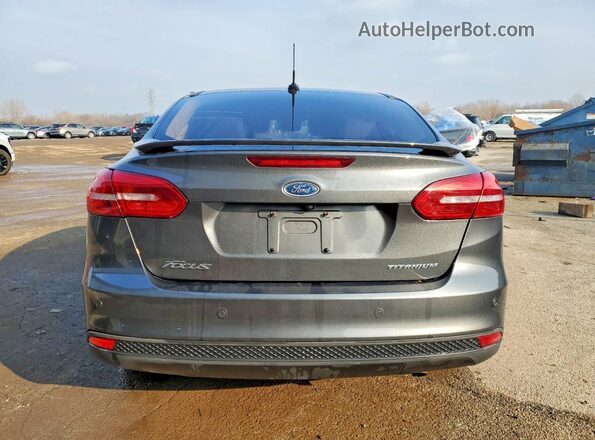 1FADP3J27HL259910 2017 FORD FOCUS Угольный Вид сзади