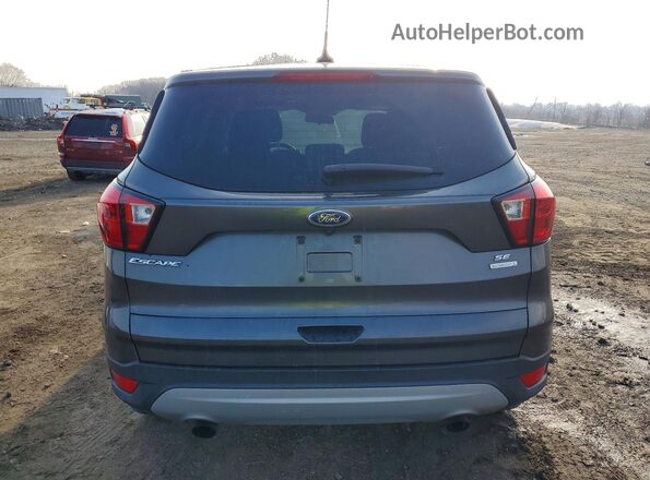 1FMCU0GD9KUA59615 2019 FORD ESCAPE Gray Front interior view