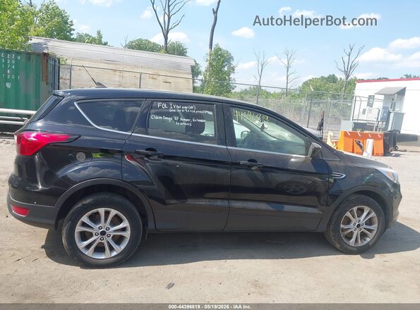 1FMCU9GD2KUA37556 2019 FORD ESCAPE Черный Вид задней части салона