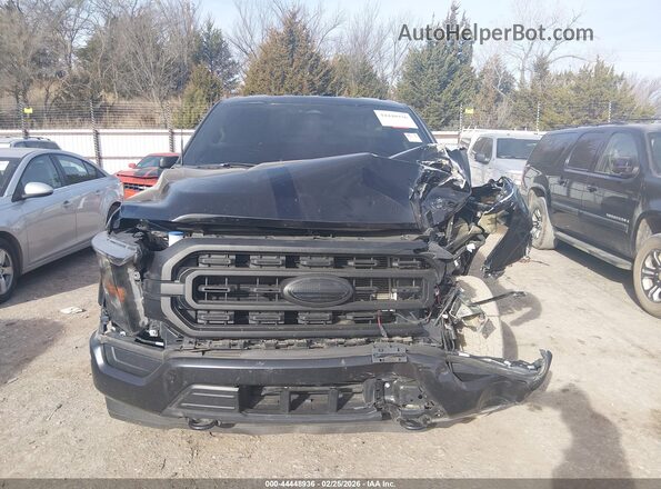 1FTEW1EP1PKD17557 2023 FORD F150 Черный Вид задней части салона
