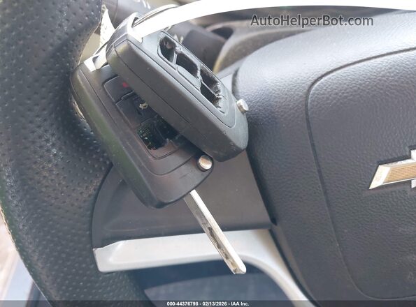 1G1JB5SHXJ4135830 2018 CHEVROLET SONIC Silver Widok deski rozdzielczej