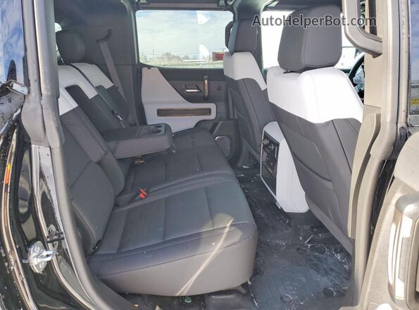 1GKT0RDC1SU118760 2025 GMC HUMMER Черный Вид задней части салона