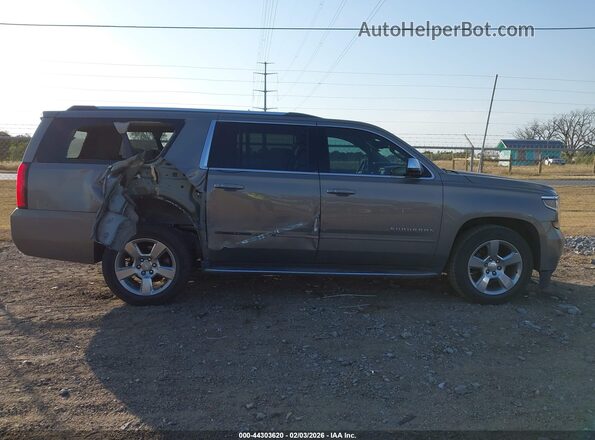 1GNSCJKC7HR208551 2017 CHEVROLET SUBURBAN Золотой Вид задней части салона
