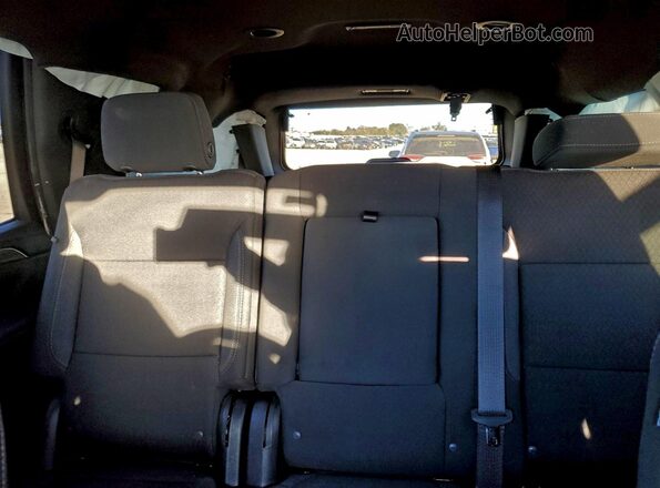 1GNSCMKD0RR366144 2024 CHEVROLET TAHOE Red Vista de los asientos traseros