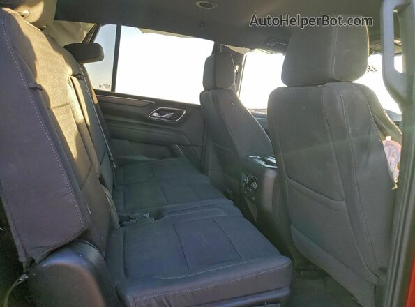 1GNSCMKD0RR366144 2024 CHEVROLET TAHOE Red Vista interior trasera