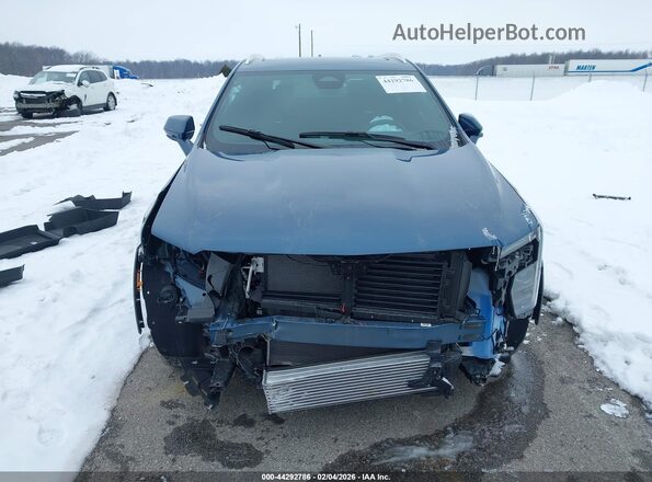 1GYFZCR43RF253180 2024 CADILLAC XT4 Синий Вид задней части салона