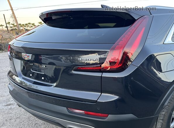 1GYFZDR43PF174188 2023 CADILLAC XT4 Black Tył prawy
