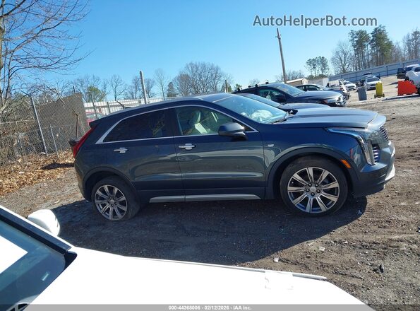 1GYFZDR46KF194699 2019 CADILLAC XT4 Зеленый Вид задней части салона