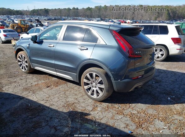 1GYFZDR46KF194699 2019 CADILLAC XT4 Зеленый Задняя левая четверть