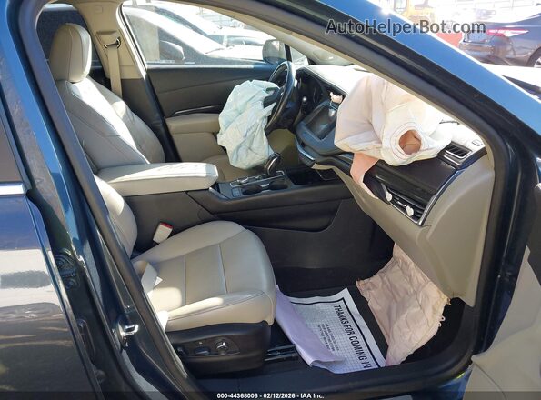 1GYFZDR46KF194699 2019 CADILLAC XT4 Зеленый Вид салона спереди