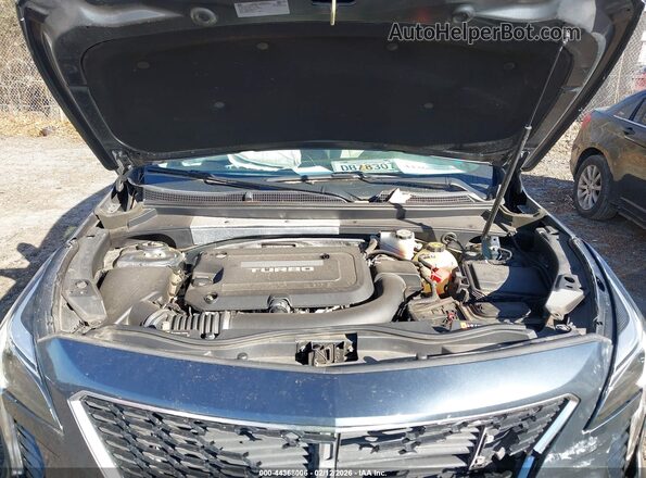 1GYFZDR46KF194699 2019 CADILLAC XT4 Зеленый Вид сзади