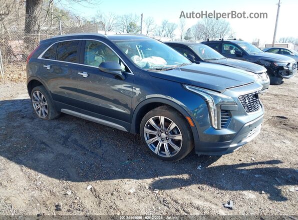 1GYFZDR46KF194699 2019 CADILLAC XT4 Зеленый Передняя правая четверть