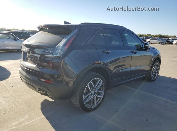 1GYFZER47PF100682 2023 CADILLAC XT4 Черный Задняя правая четверть