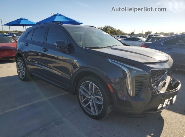 1GYFZER47PF100682 2023 CADILLAC XT4 Черный Передняя правая четверть