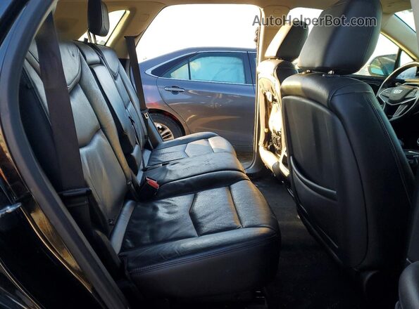 1GYKNFRS1JZ236522 2018 CADILLAC XT5 Черный Вид задней части салона