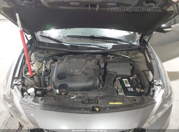 1N4AA6AP5GC381522 2016 NISSAN MAXIMA Серебряный Вид сзади