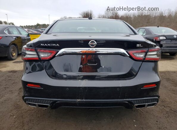 1N4AA6AV7KC382632 2019 NISSAN MAXIMA Черный Вид сзади